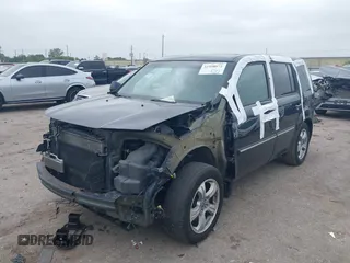 2012 Honda Pilot EX-L with VIN 5FNYF4H52CB070811, listed as a IAAI auction lot 41938672 with 156,446 mi miles and . Bid and sale history available at DreamBid. Image 2.