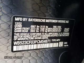 2023 BMW iX xDrive50 with VIN WB523CF03PCM54871, listed as a Copart auction lot 45988445 with 21,056 mi miles and Salvage Title. Bid and sale history available at carsss.com. Image 12.