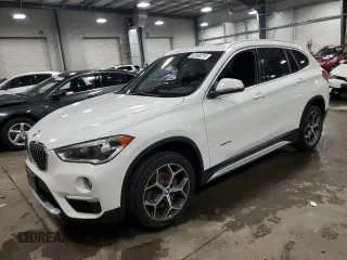 2017 BMW X1 xDrive28i z VIN WBXHT3Z38H4A53824, wystawiony jako Copart lot #52500215 z przebiegiem 106 782 mil mil oraz Szkoda całkowita • Salvage title. Historia ofert i sprzedaży dostępna na DreamBid. Obrazek 1.