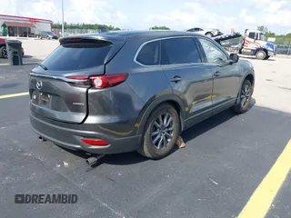 2021 Mazda CX-9 Touring с VIN JM3TCACY4M0511512, выставлен на аукционе IAAI как лот 42376544 с пробегом 50 485 миль миль и . История ставок и продаж доступна на DreamBid. Изображение 4.