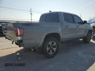 2020 Toyota Tacoma SR5 with VIN 3TMAZ5CN2LM137991, listed as a Copart auction lot 60317895 with 98,054 mi miles and Salvage title. Bid and sale history available at DreamBid. Image 3.