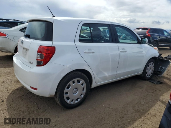 2009 Scion xD with VIN JTKKU10499J033911, listed as a Copart auction lot 51537495 with 123,584 mi miles and Salvage Title. Bid and sale history available at carsss.com. Image 3.
