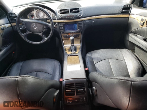 2007 Mercedes-Benz E 550 with VIN WDBUF72X67B017708, listed as a Copart auction lot 51287145 with 102,874 mi miles and Salvage Title. Bid and sale history available at DreamBid. Image 8.