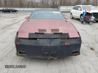 1989 Pontiac Firebird z VIN 1G2FW2181KL244335, wystawiony jako Copart lot #51469365 z przebiegiem 150 615 mil mil oraz Czysty tytuł • Clean title. Historia ofert i sprzedaży dostępna na DreamBid. Obrazek 5.