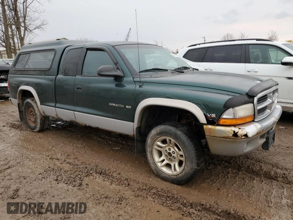 1999 Dodge Dakota SLT with VIN 1B7GG22X4XS309050, listed as a Copart auction lot 82030864 with 141,396 mi miles and Non Repairable. Bid and sale history available at DreamBid. Image 4.