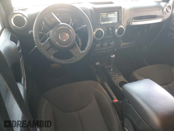 2017 Jeep Wrangler Unlimited Rubicon with VIN 1C4BJWFG4HL677477, listed as a Copart auction lot 57758175 with 89,584 mi miles and Salvage title. Bid and sale history available at DreamBid. Image 8.