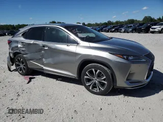 2021 Lexus RX 350 with VIN 2T2HZMDA0MC260229, listed as a Copart auction lot 57242465 with 51,051 mi miles and Salvage title. Bid and sale history available at DreamBid. Image 4.