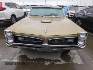 1967 Pontiac GTO z VIN 242077Z108825, wystawiony jako Copart lot #74747314 z przebiegiem 84 793 mil mil oraz Szkoda całkowita • Salvage title. Historia ofert i sprzedaży dostępna na DreamBid. Obrazek 5.