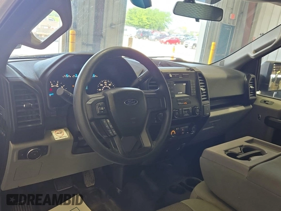 2016 Ford F-150 XLT with VIN 1FTFX1EF7GKD19449, listed as a IAAI auction lot 42665584 with 242,059 mi miles and . Bid and sale history available at DreamBid. Image 4.
