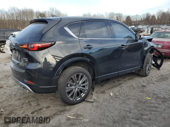 2024 Mazda CX-5 2.5 Turbo Signature with VIN JM3KFBXY7R0515256, listed as a Copart auction lot 87404694 with 4,699 mi miles and Salvage Title. Bid and sale history available at carsss.com. Image 3.