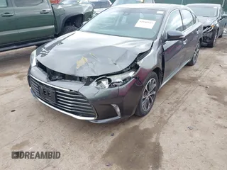 2018 Toyota Avalon XLE with VIN 4T1BK1EB9JU275097, listed as a IAAI auction lot 41940585 with 119,854 mi miles and . Bid and sale history available at DreamBid. Image 6.