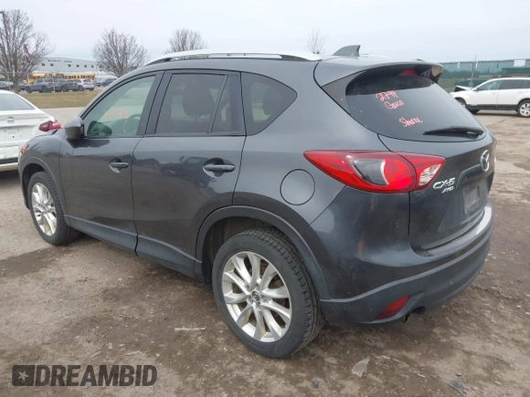 2014 Mazda CX-5 Grand Touring with VIN JM3KE4DY4E0343863, listed as a IAAI auction lot 41770402 with 117,615 mi miles. Bid and sale history available at carsss.com. Image 3.