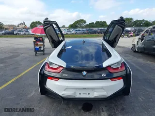 2015 BMW i8 with VIN WBY2Z2C51FV392661, listed as a IAAI auction lot 38409147 with 79,082 mi miles. Bid and sale history available at carsss.com. Image 16.
