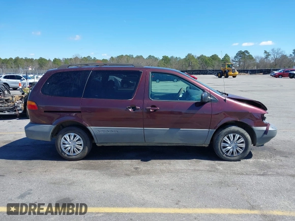 1999 Toyota Sienna LE with VIN 4T3ZF13C1XU112717, listed as a IAAI auction lot 41725827 with 272,639 mi miles. Bid and sale history available at carsss.com. Image 13.