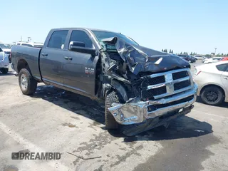 2015 Ram 2500 Tradesman z VIN 3C6UR5CJ8FG558537, wystawiony jako IAAI lot #42520286 z przebiegiem 150 255 mil mil oraz . Historia ofert i sprzedaży dostępna na DreamBid. Obrazek 1.