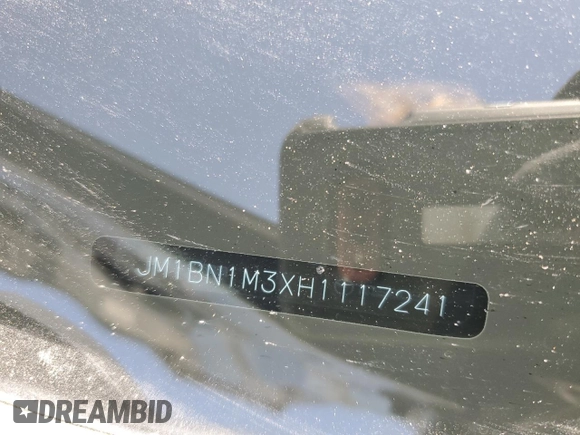 2017 Mazda 3 Grand Touring z VIN JM1BN1M3XH1117241, wystawiony jako Copart lot #53499295 z przebiegiem 63 886 mil mil oraz Szkoda całkowita • Salvage title. Historia ofert i sprzedaży dostępna na DreamBid. Obrazek 14.