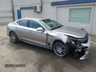 2023 Genesis G70 2.0T with VIN KMTG34TA0PU123657, listed as a Copart auction lot 72560954 with 26,678 mi miles and Salvage Title. Bid and sale history available at carsss.com. Image 4.