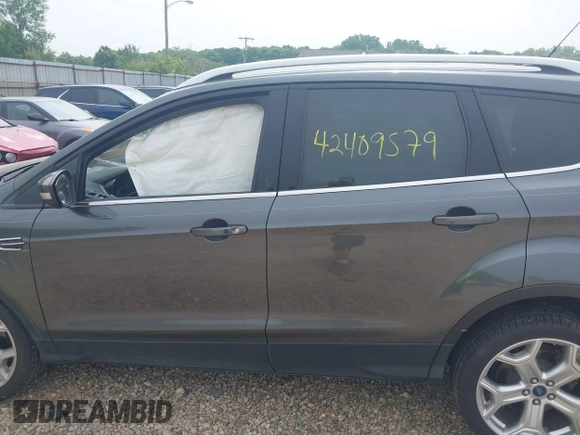 2019 Ford Escape Titanium with VIN 1FMCU0J97KUA34281, listed as a IAAI auction lot 42409579 with 55,400 mi miles and . Bid and sale history available at DreamBid. Image 15.