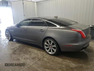 2019 Jaguar XJ Portfolio with VIN SAJWA2G71K8W19797, listed as a Copart auction lot 54133195 with 57,446 mi miles and Salvage Title. Bid and sale history available at DreamBid. Image 2.
