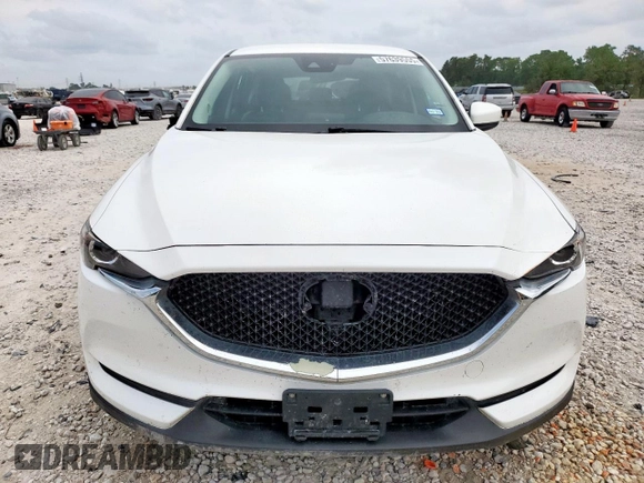 2020 Mazda CX-5 Touring z VIN JM3KFACM6L0787687, wystawiony jako Copart lot #57639555 z przebiegiem 91 219 mil mil oraz Szkoda całkowita • Salvage title. Historia ofert i sprzedaży dostępna na DreamBid. Obrazek 5.