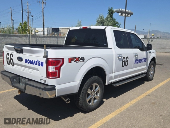 2018 Ford F-150 XL with VIN 1FTEW1E59JKD11351, listed as a IAAI auction lot 42663848 with 128,761 mi miles and . Bid and sale history available at DreamBid. Image 45.