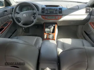 2003 Toyota Camry LE with VIN 4T1BE30K43U724778, listed as a Copart auction lot 53515605 with 176,568 mi miles and Salvage Title. Bid and sale history available at DreamBid. Image 8.