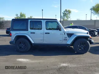 2023 Jeep Wrangler Willys with VIN 1C4HJXDG3PW577807, listed as a IAAI auction lot 42323674 with 28,808 mi miles and . Bid and sale history available at DreamBid. Image 13.