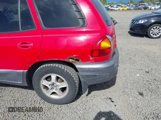 2004 Hyundai Santa Fe GLS with VIN KM8SC13D34U638662, listed as a IAAI auction lot 42126589 with 196,428 mi miles. Bid and sale history available at carsss.com. Image 6.