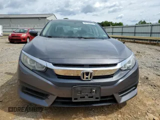 2017 Honda Civic LX z VIN 19XFC2F55HE214470, wystawiony jako Copart lot #57785675 z przebiegiem 81 862 mil mil oraz Szkoda całkowita • Salvage title. Historia ofert i sprzedaży dostępna na DreamBid. Obrazek 5.