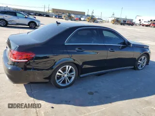 2014 Mercedes-Benz E 400 Sport with VIN WDDHF9FB2EA832266, listed as a Copart auction lot 43920075 with 56,524 mi miles and Salvage Title. Bid and sale history available at DreamBid. Image 3.