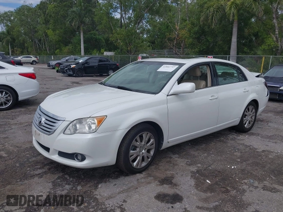 2010 Toyota Avalon XL with VIN 4T1BK3DB8AU354533, listed as a IAAI auction lot 41802797 with 117,956 mi miles and . Bid and sale history available at carsss.com. Image 2.