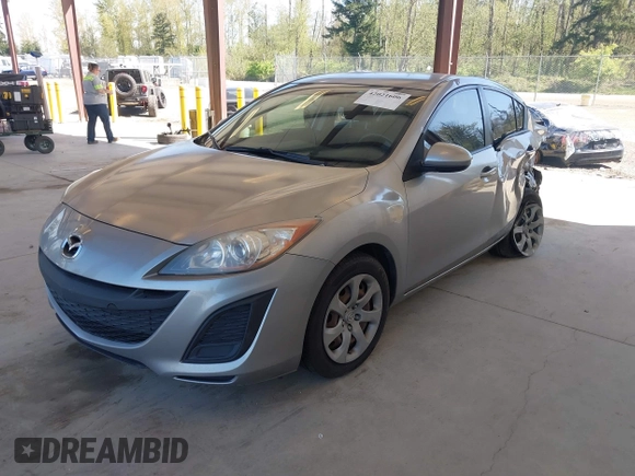2011 Mazda Mazda3 i Sport with VIN JM1BL1UF4B1433743, listed as a IAAI auction lot 42021606 with 116,288 mi miles. Bid and sale history available at carsss.com. Image 16.