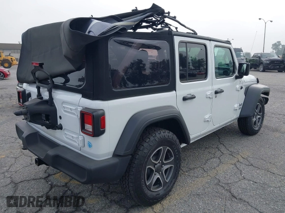 2021 Jeep Wrangler Unlimited Sport Altitude with VIN 1C4HJXDN5MW644613, listed as a IAAI auction lot 42466188 with 63,959 mi miles and . Bid and sale history available at DreamBid. Image 4.