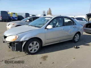 2008 Kia Spectra EX with VIN KNAFE122785581184, listed as a Copart auction lot 84539604 with 173,820 mi miles and Salvage title. Bid and sale history available at DreamBid. Image 1.
