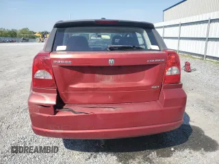 2009 Dodge Caliber SXT with VIN 1B3HB48A29D144304, listed as a Copart auction lot 53119375 with 173,778 mi miles and Salvage Title. Bid and sale history available at DreamBid. Image 6.