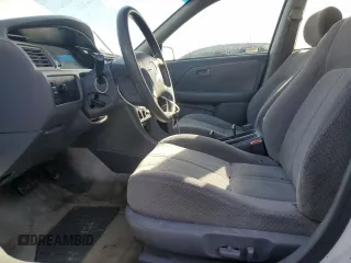 2000 Toyota Camry CE with VIN JT2BG22K0Y0470743, listed as a Copart auction lot 51980385 with 300,464 mi miles and Salvage Title. Bid and sale history available at carsss.com. Image 7.