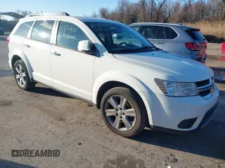 2013 Dodge Journey Crew with VIN 3C4PDCDG3DT521556, listed as a IAAI auction lot 41852888 with 209,562 mi miles and . Bid and sale history available at DreamBid. Image 1.