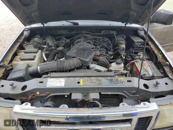 2006 Ford Ranger XLT z VIN 1FTZR45E06PA41561, wystawiony jako Copart lot #58364735 z przebiegiem 203 488 mil mil oraz Czysty tytuł • Clean title. Historia ofert i sprzedaży dostępna na DreamBid. Obrazek 11.