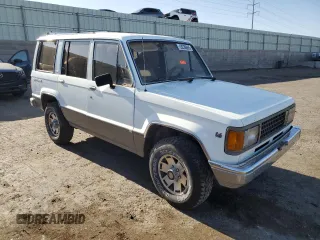 1990 Isuzu Trooper с VIN JACCH58R2L8912963, выставлен на аукционе Copart как лот 53236865 с пробегом 206 634 миль миль и Чистый • Clean title. История ставок и продаж доступна на DreamBid. Изображение 4.