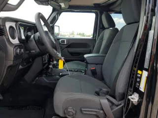 2024 Jeep Wrangler Sport S with VIN 1C4PJXDNXRW349946, listed as a Copart auction lot 56701185 with 6,310 mi miles and Salvage Title. Bid and sale history available at DreamBid. Image 7.