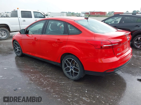 2017 Ford Focus SE with VIN 1FADP3FE9HL222795, listed as a IAAI auction lot 42425996 with 90,724 mi miles and . Bid and sale history available at DreamBid. Image 3.