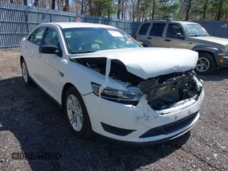 2015 Ford Taurus SE with VIN 1FAHP2D80FG176157, listed as a IAAI auction lot 41985771 with 102,252 mi miles and . Bid and sale history available at carsss.com. Image 1.