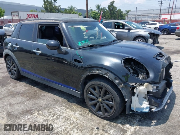 2015 MINI Hardtop 4 Door S with VIN WMWXU3C58F2B66601, listed as a IAAI auction lot 42444404 with 76,174 mi miles and . Bid and sale history available at DreamBid. Image 1.
