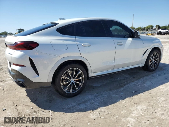2022 BMW X6 xDrive40i with VIN 5UXCY6C06N9J13344, listed as a Copart auction lot 49278715 with 83,632 mi miles and Clean Title. Bid and sale history available at carsss.com. Image 3.
