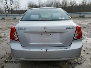 2006 Suzuki Forenza z VIN KL5JD56Z46K374920, wystawiony jako Copart lot #86255044 z przebiegiem 58 669 mil mil oraz Szkoda całkowita • Salvage title. Historia ofert i sprzedaży dostępna na DreamBid. Obrazek 6.