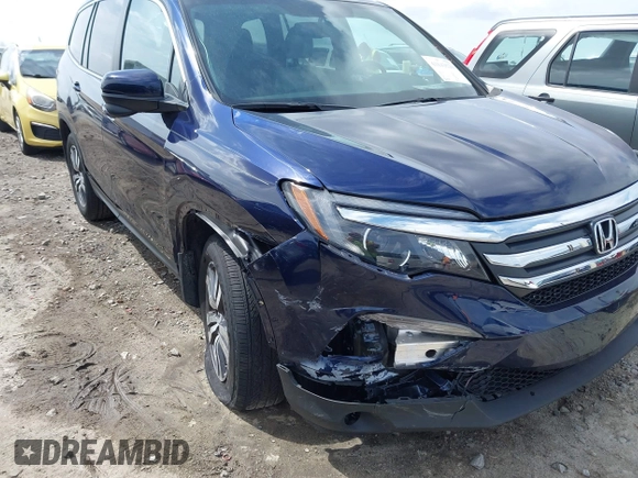 2018 Honda Pilot EX-L with VIN 5FNYF5H5XJB025960, listed as a IAAI auction lot 41843520 with 23,404 mi miles and . Bid and sale history available at DreamBid. Image 6.