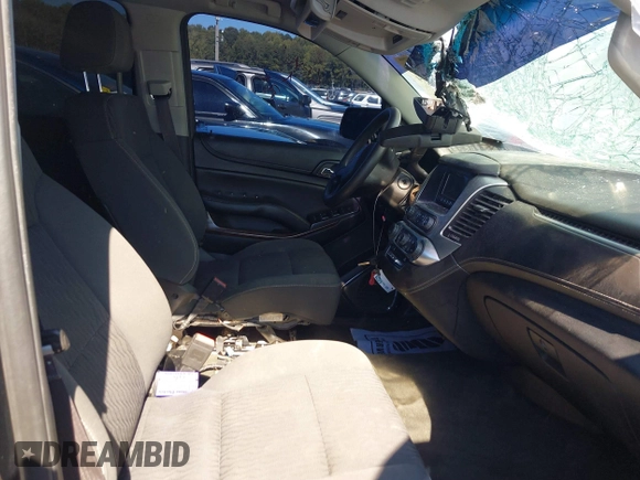 2015 Chevrolet Tahoe Commercial with VIN 1GNLC2EC3FR280365, listed as a IAAI auction lot 40580594 with 195,740 mi miles and . Bid and sale history available at DreamBid. Image 5.