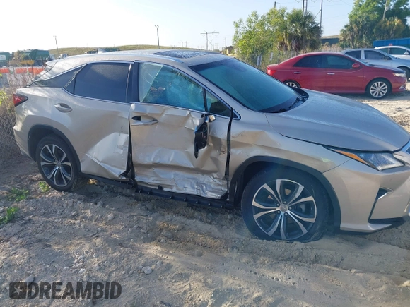 2016 Lexus RX 350 with VIN 2T2ZZMCA7GC007449, listed as a IAAI auction lot 41926313 with 74,619 mi miles and . Bid and sale history available at DreamBid. Image 6.