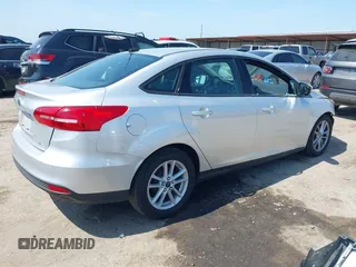 2017 Ford Focus SE with VIN 1FADP3F2XHL256136, listed as a IAAI auction lot 42215479 with 89,945 mi miles and . Bid and sale history available at DreamBid. Image 4.