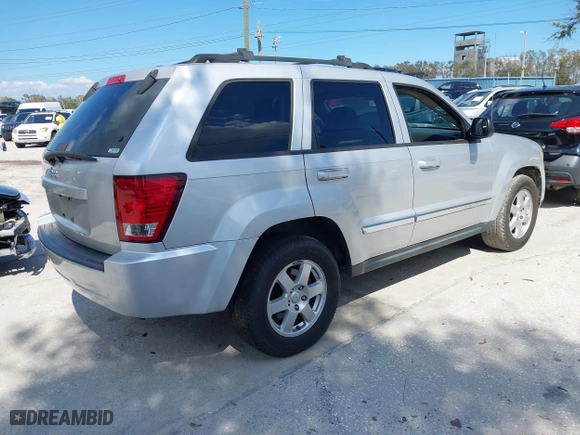 2010 Jeep Grand Cherokee Laredo with VIN 1J4PS4GK3AC163307, listed as a IAAI auction lot 41681527 with 155,464 mi miles. Bid and sale history available at carsss.com. Image 4.